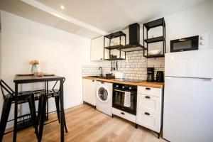 Appartements Studio cosy equipe, Centre ville : photos des chambres