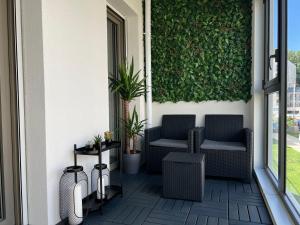 Appartements Appartement avec son jardin d’hiver : photos des chambres