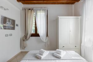 Osvaldo - parcheggio e giardino privato