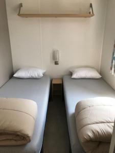 Appartements Mobil home recent de 3 chambres dans un Camping 4* : photos des chambres