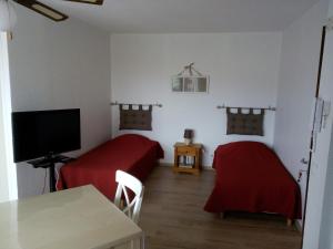 Appartements Les Bastides : photos des chambres