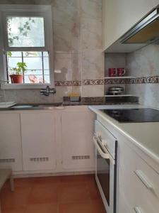 Apartamento Luminoso con Patio y Jardín