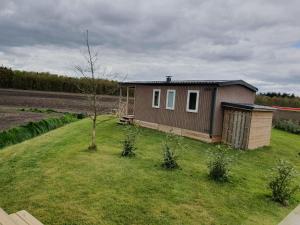 Lovely chalet in Schoonloo with patio