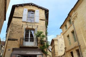 Appartements Uzes Centre Quartiers des Arts Charme de l'ancien : photos des chambres