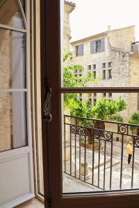 Appartements Uzes Centre Quartiers des Arts Charme de l'ancien : photos des chambres