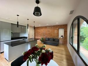 Appartements LE MOULIN DE LA FLAMBERE : photos des chambres