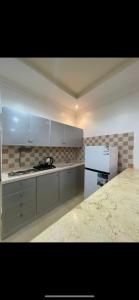 الجنى للشقق المخدومة فرع الطريق الدولي