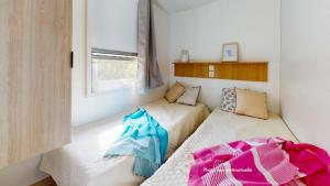 Maisons de vacances Camping Officiel Siblu Le Pipiou : photos des chambres