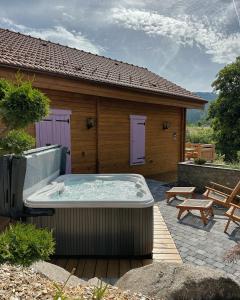 Maisons de vacances Le Montagnard SPA - Lits faits - Serviettes - Peignoirs - Menage inclus : photos des chambres