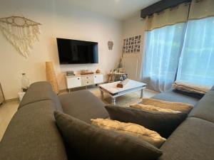 Appartements Beau duplex a 2 min du RER B : photos des chambres