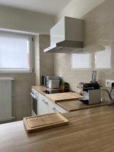 Appartements BONNE IDEE - Suite GEORGES - Meuble de tourisme 4 etoiles : photos des chambres