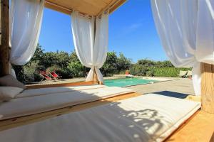 Maisons de vacances Grande maison de charme avec piscine au coeur des vergers et vignobles : photos des chambres