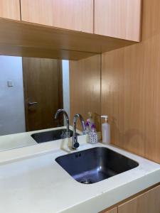 RoomQu at Apartment Tree Park