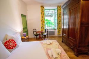 Maisons de vacances Le Pech Merle YourHostHelper : photos des chambres