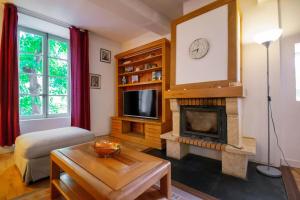 Maisons de vacances Le Pech Merle YourHostHelper : photos des chambres