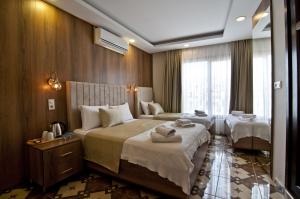 Deluxe Family Room room in IMMORTELLE HOTEL