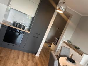 Apartament Nowoczesny w Centrum Toruniapodziemny parking i winda