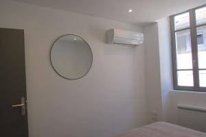 Appartements Appartement climatise au coeur des remparts : photos des chambres