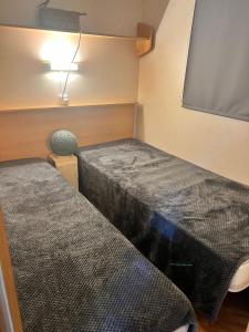 Campings Mobil-home  « le voyageur » camping **** : photos des chambres