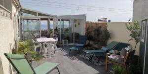 Maisons de vacances Maison chaleureuse, vue mer avec belle terrasse, : photos des chambres