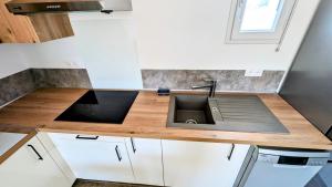 Maisons de vacances Charmant logement neuf 42 m² : photos des chambres