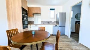 Maisons de vacances Charmant logement neuf 42 m² : photos des chambres