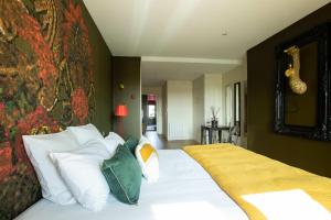 Appartements LA VILLA FLEURY - Apparthotel de standing - La Rubis brillance et douceur : photos des chambres