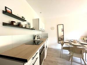 Appartements Le Jardin - Calme et Confort - Lac de Nantua : photos des chambres