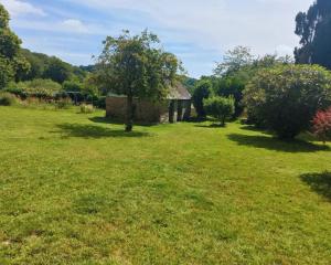 Maisons de vacances Maison en pierre au milieu du bocage : photos des chambres