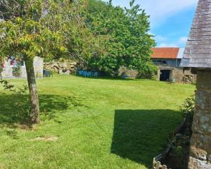 Maisons de vacances Maison en pierre au milieu du bocage : photos des chambres