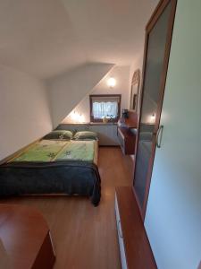 Double Room (1 Adult + 1 Child) room in Apartments Zorč