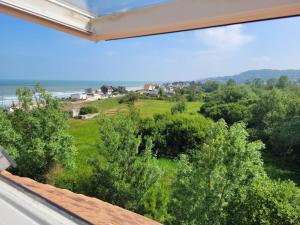 Appartements Mon Evidence - Appartement acces direct a la plage - vue mer : photos des chambres