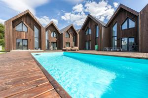 JŪRŽOLĖ home - 2 šešiaviečiai kotedžai Kunigiškiuose - by Hello Sea homes