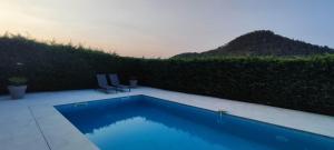 Villas Superbe villa avec piscine : photos des chambres