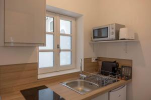 Appartements L'Illiers *Studio* + Parking velos : photos des chambres