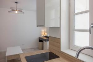 Appartements L'Illiers *Studio* + Parking velos : photos des chambres