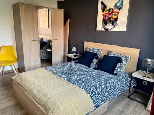 Appartements 2 p. parking gratuit 8 mn a pied du centre ville : photos des chambres