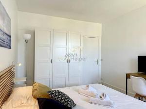 Appartements Sur la plage YourHostHelper : photos des chambres