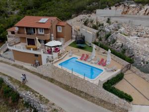 Family friendly house with a swimming pool Zagvozd, Zagora - 20945 