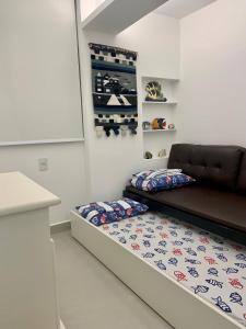 Apartamento vista do mar, pé na areia e águas tranquilas, no cento de Guarapari