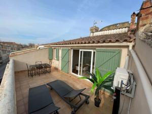 Appartements Terrasse- centre ville/historique - climatisation : photos des chambres