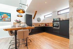 Appartements Loft Cosy et atypique : photos des chambres