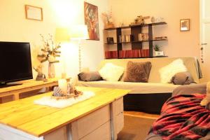 Appartements L'Aparte - Appartement cosy esprit montagne : photos des chambres