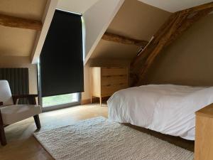 B&B / Chambres d'hotes La Ferme de Chatenoy - Le Mouton Noir : Chambre Deluxe (2 Adultes + 1 Enfant)