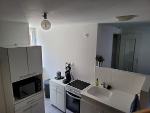 Appartements Appartement meuble Duplex T3. : photos des chambres