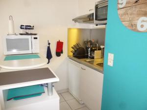 Appartement 2 pièces, balcon vue mer, parking privé, plage des Demoiselles - FR-1-224C-27