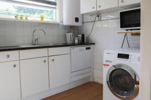 Familie bungalow op vakantiepark bij zee