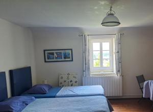 B&B / Chambres d'hotes Le Jardin Umal : Chambre Lits Jumeaux avec Salle de Bains Privative