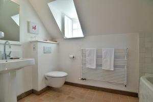 Maisons de vacances Le Verger - Charmante maison avec jardin : photos des chambres