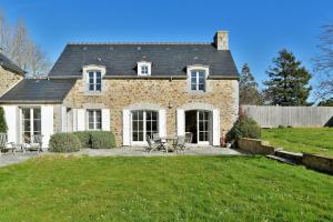 Maisons de vacances Le Verger - Charmante maison avec jardin : photos des chambres